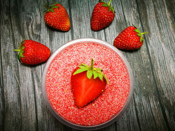 High angle view of strawberries on table