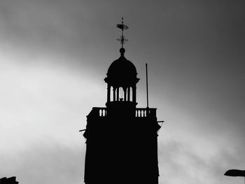 Low angle view of silhouette church against sky