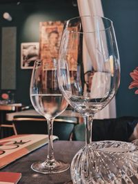 Midsection of woman holding wineglass