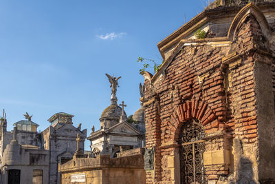 Low angle view of historic building against sky