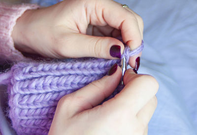 Close-up of human hand holding hands