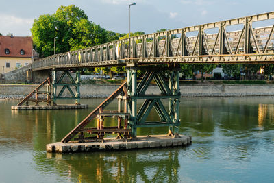 Bridge over river against sky