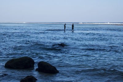 Scenic view of sea against clear sky