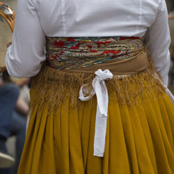 Rear view of two women standing on cross