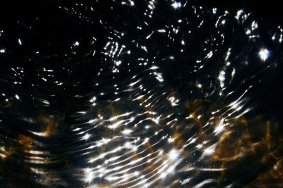 Full frame shot of rippled water at night
