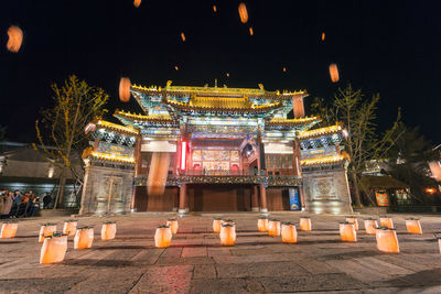 Illuminated lanterns at night