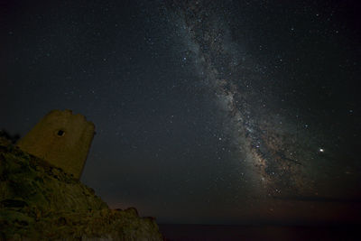 Low angle view of star field against sky at night