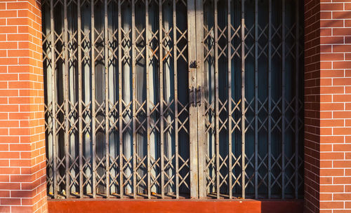 Closed metal gate of building