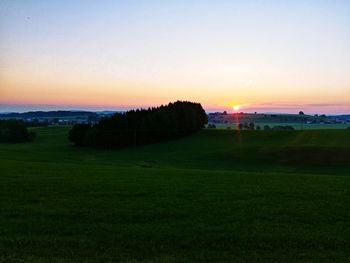 Scenic view of landscape against sky during sunset