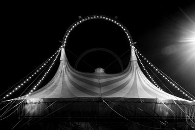 Light trails on suspension bridge at night