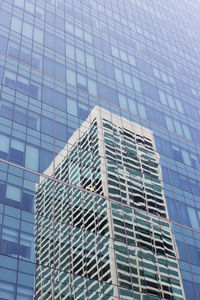 Low angle view of modern building against clear sky