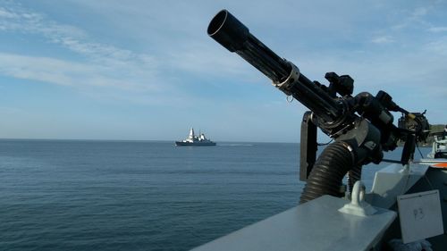 Ship in sea against sky