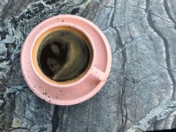 High angle view of coffee cup on table