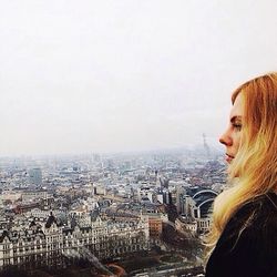 Woman standing in city