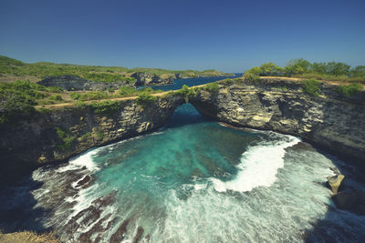 Amazing wonderful seashore aerial view of beach located in nusa penida, southeast of bali island.
