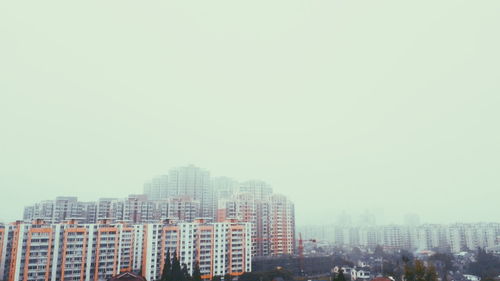 View of skyscrapers against clear sky