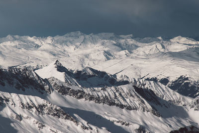 Scenic view of snow covered mountains