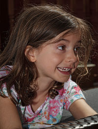 Close-up portrait of a smiling girl