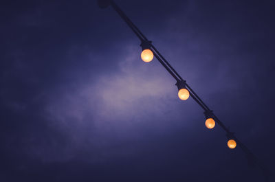 Low angle view of illuminated street light