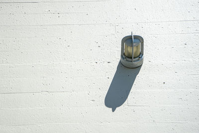 Low section of person standing on wall