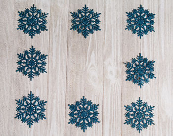 Close-up of christmas decoration on wooden table