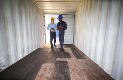 Man standing in container 