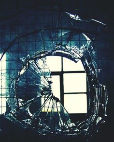 indoors, glass - material, window, transparent, home interior, close-up, still life, table, no people, architecture, built structure, decoration, pattern, wall - building feature, reflection, circle, hanging, shape, design, ceiling