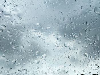 Full frame shot of wet glass window
