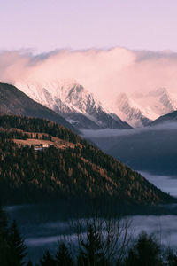 Scenic view of snowcapped mountains against sky in dolomites, italy