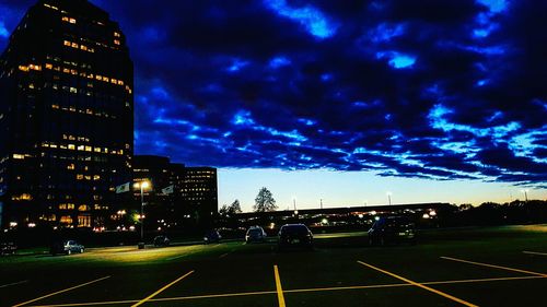 City street against cloudy sky