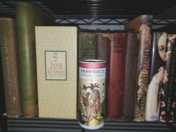 Text on books in shelf