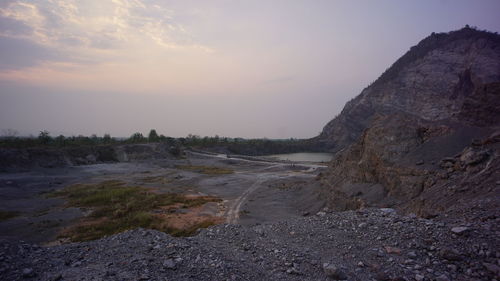 Scenic view of landscape against sky during sunset