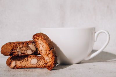 Close-up of coffee cup on table