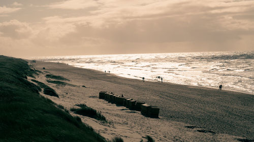 Scenic view of beach against sky