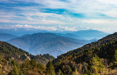 Multilayer mountain range of himalaya with valley view and amazing sky at day from flat angle