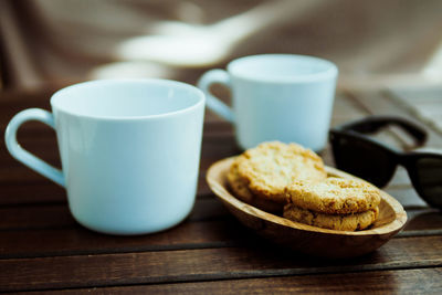 Close-up of coffee cup on table