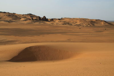 Scenic view of desert against sky