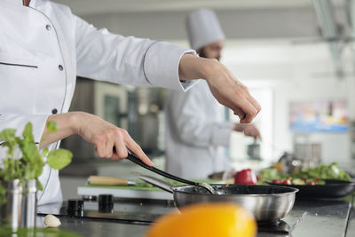 Chef preparing food at restaurant