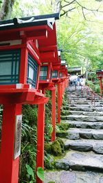 Staircase by building against trees