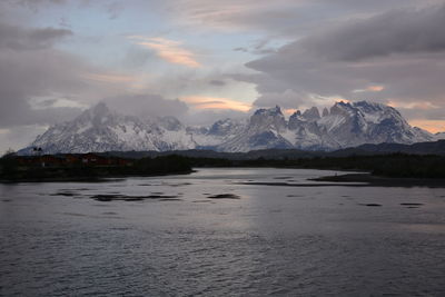 Scenic view of landscape against cloudy sky