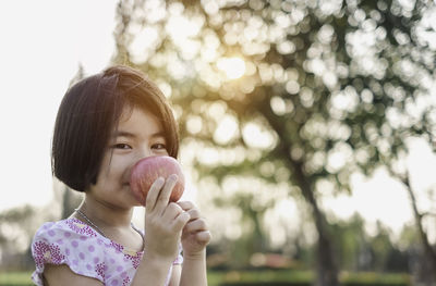 Portrait of a girl holding ice cream