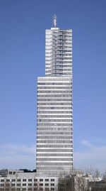 Low angle view of building against blue sky