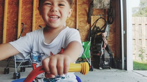 Close-up of boy smiling