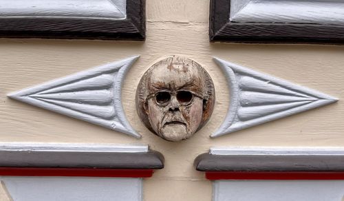 Close-up of human hand on door