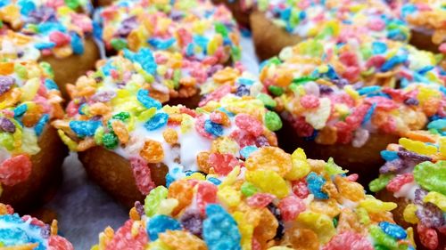 Close-up of multi colored donuts