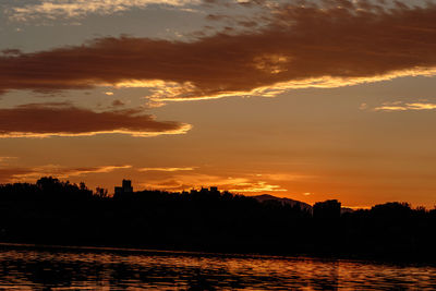 Scenic view of silhouette trees against sky during sunset