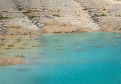 High angle view of swimming pool by sea