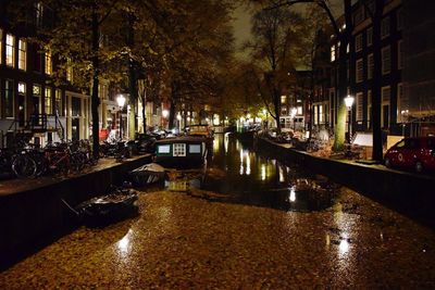 Canal in city at night