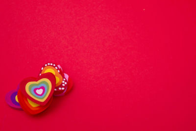 Close-up of cupcakes against red background