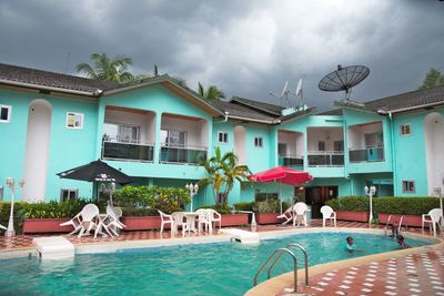 View of swimming pool against buildings